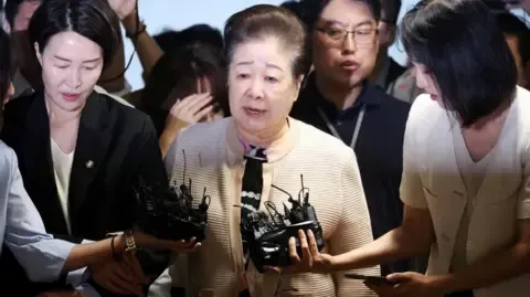 Disputed Religious Head Dismisses Bribery Allegations Against Ex-South Korea President's Wife